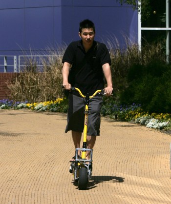 A Google employee rides his scooter at the Google Campus. Photo: Getty