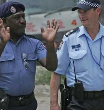 Australian Federal Police work alongside the Papua New Guinea Royal Constabulary