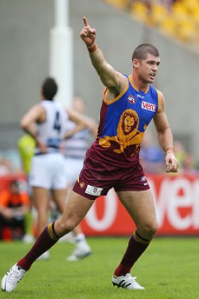 Brown's trademark celebration after kicking a goal. Photo: Getty