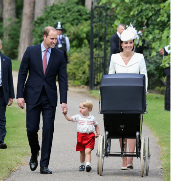 The Duke and Duchess of Cambridge and Prince George stroll with Princess Charlotte.