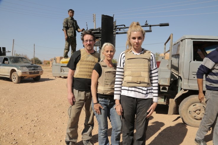 The contestants wear bullet-proof vests in Syria.