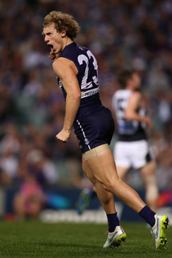 Mayne celebrates one of his four goals. Photo: Getty