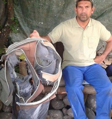 A member of a shore cleaning association with the suitcase.