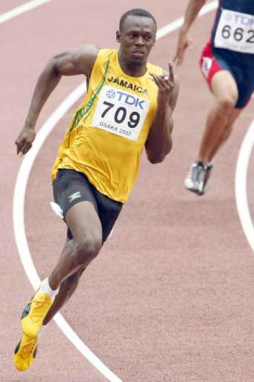 Bolt running the 200m at the 2007 World Championships. Photo: Getty