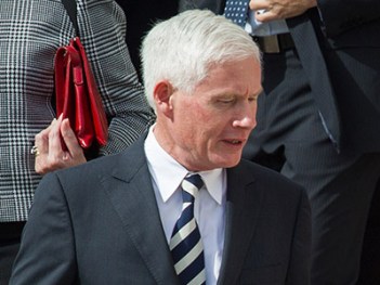 The Duchess of Cambridge shares a conversation with South Australian deputy Premier John Rau during her visit to Elizabeth in the City of Playford, thirty minutes North of Adelaide, Wednesday, April 23, 2014. (AAP Image/Ben Macmahon) NO ARCHIVING