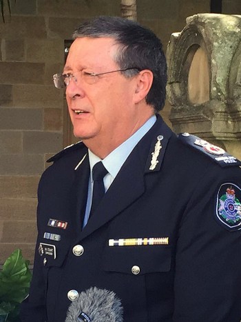 Queensland Police Minister Jo-Ann Miller (right) and  Queensland police commissioner Ian Stewart speak to the media at state parliament in Brisbane, Tuesday, Aug. 11, 2015. Stewart has been granted a two-year contract extension, which has been lambasted by the Queensland Police Union. (AAP Image/Alexandra Patrikios) NO ARCHIVING