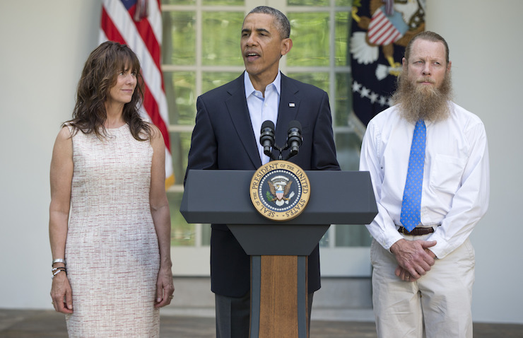 President Barack Obama (centre), Jani Bergdahl (left) and Bob Bergdahl (right) during a news conference on May 31, 2014 about the release of Sgt. Bergdahl. Photo: AAP