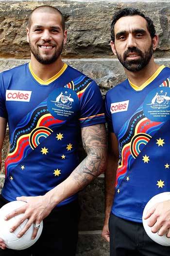 Lance Franklin and Adam Goodes model the Indigenous Team guernseys in 2013. Photo: Getty