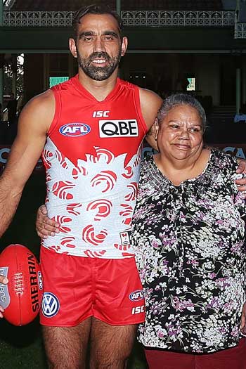 Goodes with his mother, Lisa Sansbury, who designed the Swans Indigenous Round guernsey. Photo: Getty