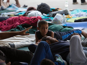 Migrants gather in the transit zone of Keleti station which remains closed to them in central Budapest on September 2. Photo: Getty