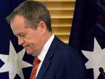 Australian Federal Opposition Leader Bill Shorten departs the stage after addressing the Federal Labor Caucus meeting inside the Federal Labor Party Room meeting at Australian Parliament House in Canberra, Tuesday, Sept. 15, 2015. Australian Prime Minister designate Malcolm Turnbull last night won the Australian Federal Leadership in a party ballot vote, at Australian Parliament House. (AAP Image/Sam Mooy) NO ARCHIVING