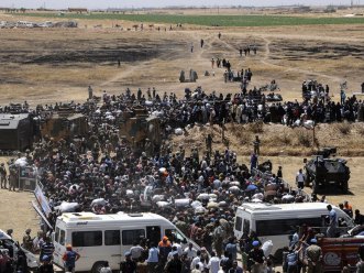 Syrian refugees escape violence between Islamic State and rebel groups. Photo: Getty