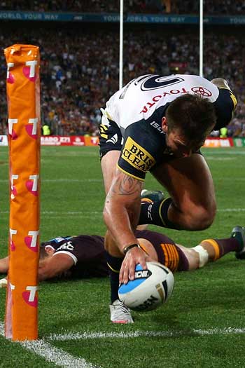 Kyle Feldt scores in the corner to tie up the scores after the siren. Photo: Getty