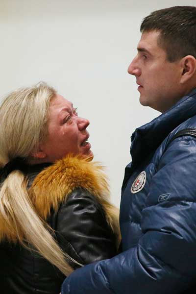 Relatives of passengers waited for news at