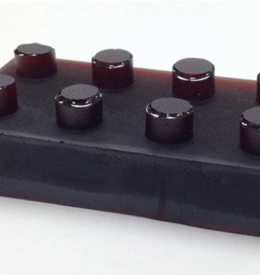 A block of the sulfur-limonene polysulfide: a polymer synthesised entirely from industrial by-products.