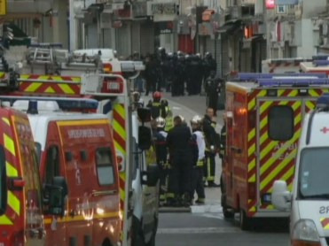 Day breaks as the raid continues. Photo: ABC