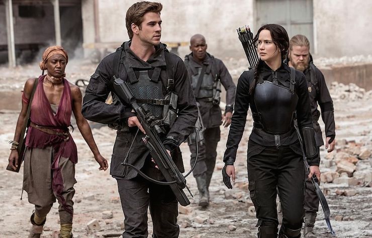 Liam Hemsworth and Jennifer Lawrence play teenagers caught in wide-scale rebellion.
