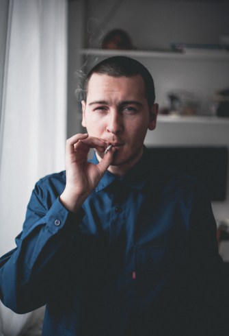 men with cigarette