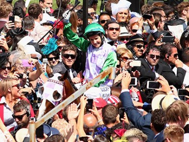 MELBOURNE, AUSTRALIA - NOVEMBER 03: Michelle Payne riding Prince of Penzance returns to scale after winning race 7, the Emirates Melbourne Cup on Melbourne Cup Day at Flemington Racecourse on November 3, 2015 in Melbourne, Australia. (Photo by Quinn Rooney/Getty Images)