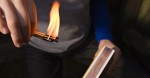 Boy playing with fire