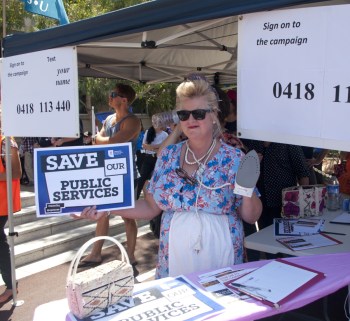 A Perth protestor dresses as a housewife in protest of the inquiry. Photo: AAP