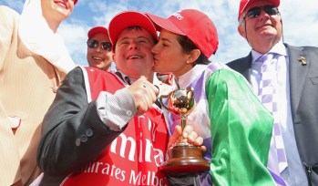 Michelle Payne kisses her brother, strapper Stevie Payne after her Melbourne Cup win. Photo: Getty