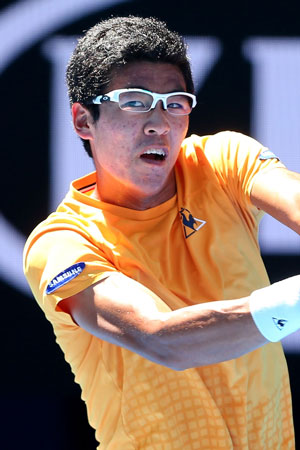 Hyeon Chung. Didn't last long, but his persimmon infused Le Coq Sportif job made an impression. Photo: Getty