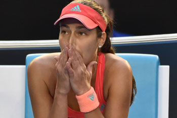 Ana Ivanovic looks on as Sears receives treatment. Photo: Getty