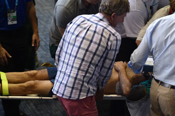 Nigel Spears is taken from Rod Laver Arena on a stretcher. Photo: Getty
