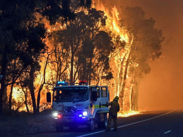 Firefighters battle a blaze in Waroona.