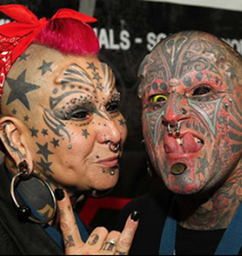 Two eyeball tattoo recipients at a festival in Brazil.