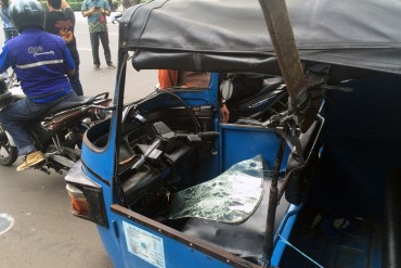 Angry drivers smashed taxis not participating in the protest. Photo: AAP