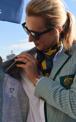 Lou Bawden shows off the blazer’s inside - emblazoned with the names of 2016 athletes and past gold medallists. Photo: Getty