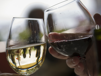 Don't worry about how you hold your wine, unless you're a very slow drinker. Photo: Getty