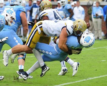 Gotsis applies a trademark powerful tackle. Photo: Getty