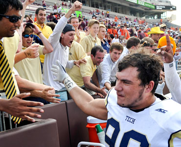 Gotsis mingles with fans after a Georgia Tech match. Photo: Getty