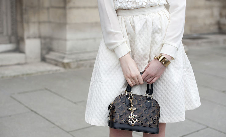 On real designer handbags, the logos rarely disappear into the seams. Photo: Getty