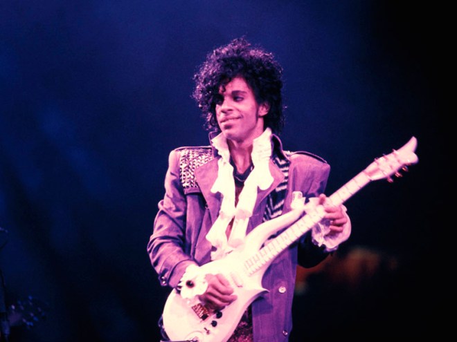 Prince on guitar during his Purple Rain tour in the 1980s.
