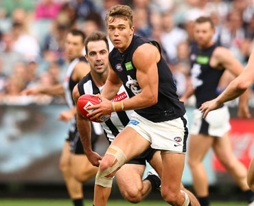 A common sight: Patrick Cripps bursts through the midfield. Photo: Getty