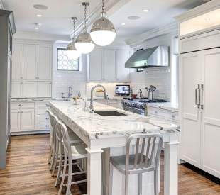 The spacious, light-filled kitchen complete with marble bench top. Photo: Getty