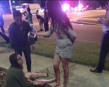 A woman at the scene covered in blood. Photo: Twitter