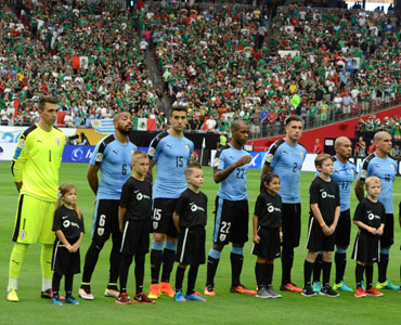 Uruguay players look bemused. Photo: Getty