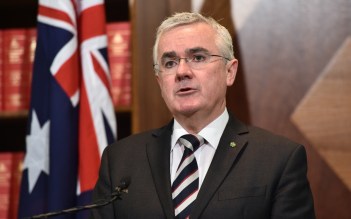 Mr Wilkie was qualified in his support for the new Coalition government.