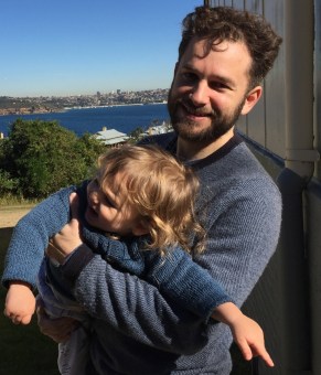 Besser with one of his three children.