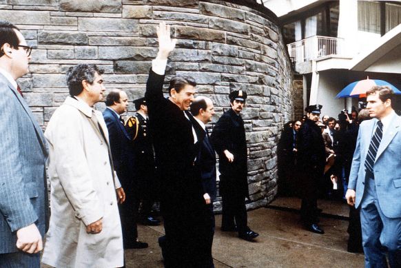 Ronald Reagan moments before an assassination attempt by John Hinckley Jr in 1981.