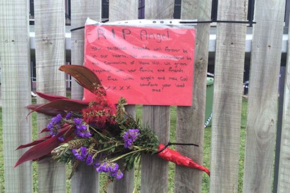 Flowers and messages of support have been left outside Shelley's Backpackers.