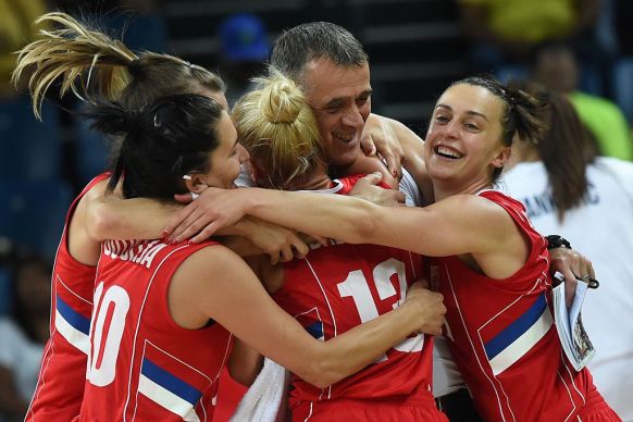 Serbia are all smiles after their surprise win.