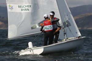 Mathew Belcher (helm) and Will Ryan celebrate winning silver in the Men's 470 sailing. Photo: Getty/Clive Mason