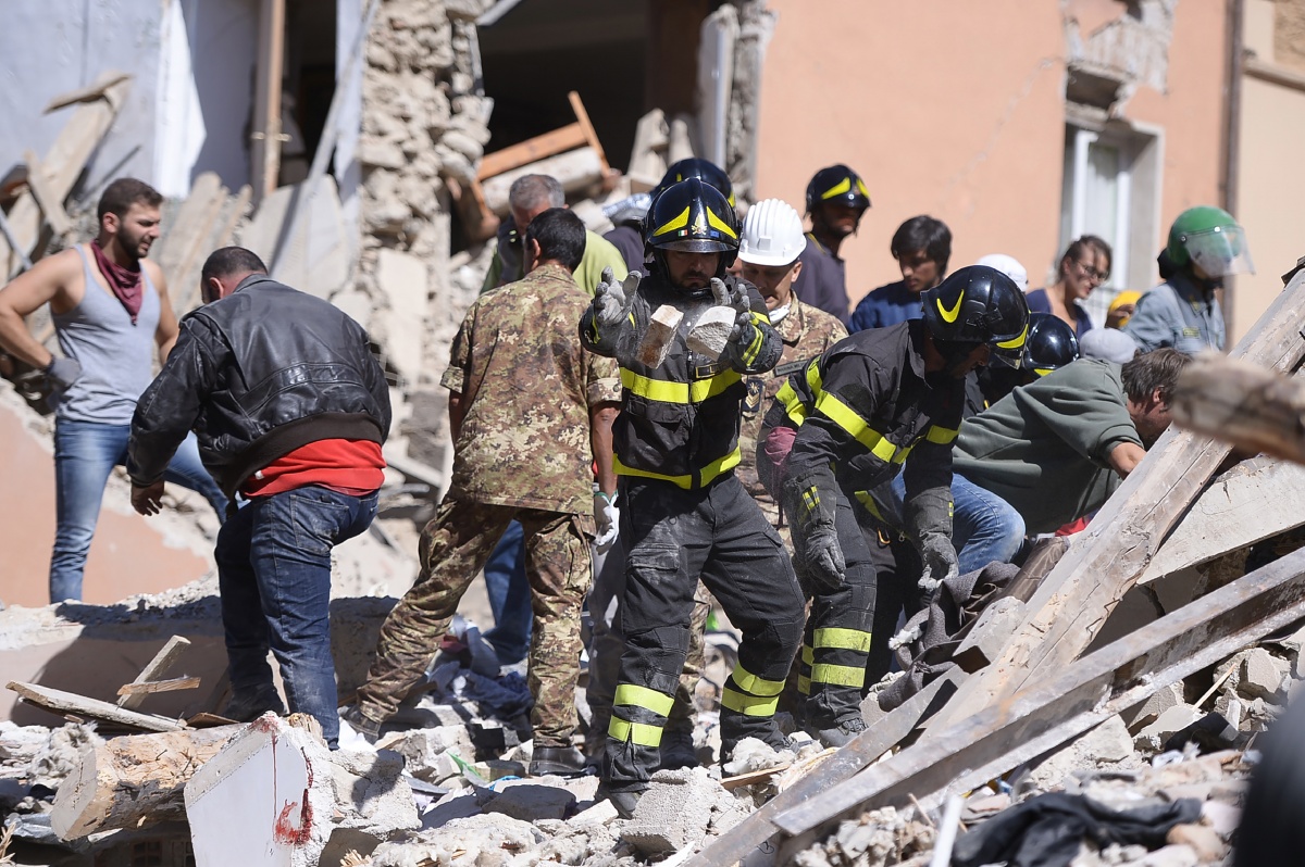 Rescuers work frantically to free victims. Photo: Getty