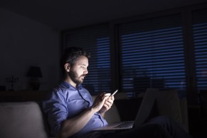 Australians spend 46 hours a week looking at a screen, but just six hours with family and friends. Photo: Getty